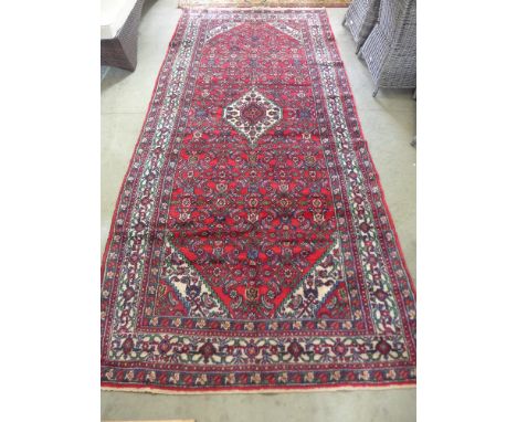 A red ground handmade Persian Hamadan carpet - 3.58 cm x 1.65 cm 