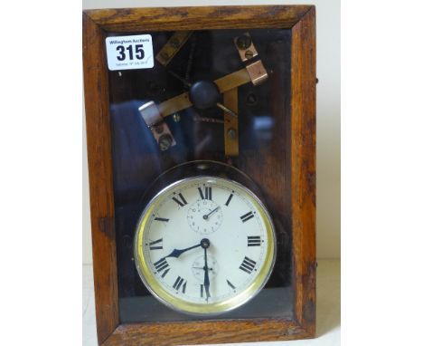 An unusual spring wind alarm clock with mains shut off 24cm tall