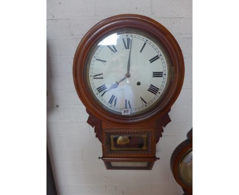 A drop dial wall clock striking on a bell 71cm tall