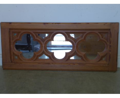 A Gothic pitch pine panel with a mirrored back - 1.33 m x 56 cm