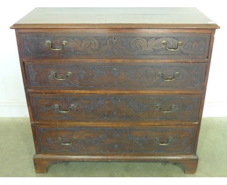 A Georgian oak four drawer chest with later carving - Height 1.04 m x With 1.11 m x Depth 58 cm 