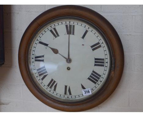 A wall clock with a 12 inch painted dial - 16cm diameter