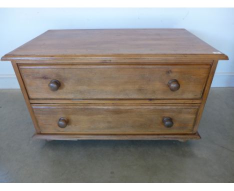 A modern two drawer pine chest - Height 59 cm x Width 1 m x Depth 58 cm 