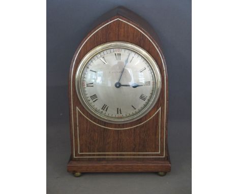 A Lancet clock by Elkington & Co - a small Edwardian eight day mahogany Lancet top mantel clock inlaid with brass stringing a