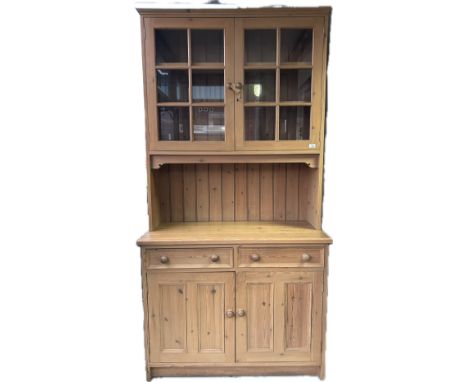 Large Pine Dresser with Two Wood Glass panel Doors with beading and two drawers over cupboard doors. With Keys [H 225 cm L 11