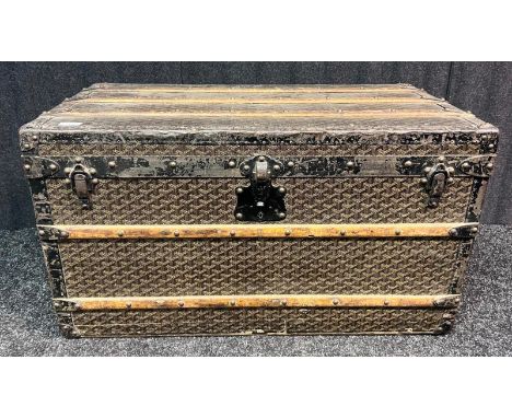 E. Goyard Aine Paris leather and wood bound steamer trunk with all over printed design, wood and metal bound, original label 