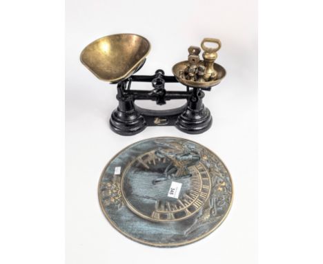 Vintage kitchen scales and weights, together with modern brass sun dial by Susan Chinn Jurist.