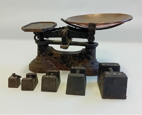 Antique weighing scales with weights