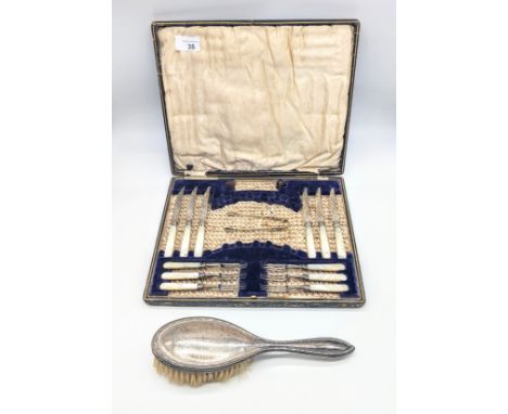 Incomplete boxed silver high tea set by James Dixon and Son LTD. Also with a silver hairbrush.