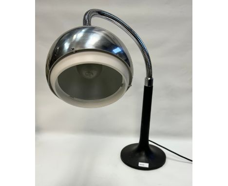 A Vintage chrome flex move free standing lamp.