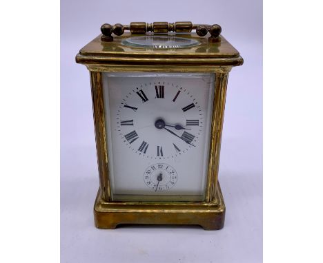 Antique brass carriage clock in leather case (No Key)