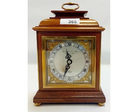 Vintage English Bracket Timepiece by Elliot and retailed by Garrard &amp; Co within a walnut case.