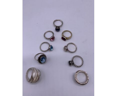 Collection of silver and white metal rings