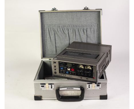 PANASONIC, VHS PORTABLE VIDEO CASSETTE RECORDER, model number AG 6400 made in Japan, with Panasonic VB30 battery pack, house 