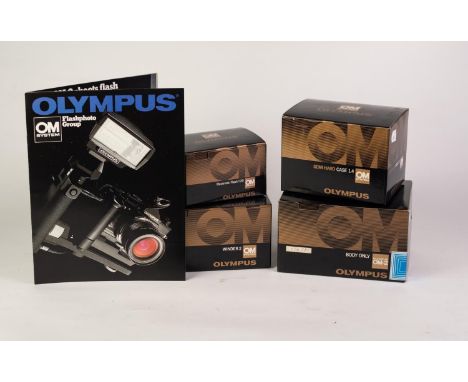OLYMPUS OM-2 SLR ROLL FILM CAMERA BODY, with instruction booklet and shoulder strap, together with an OLYMPUS 1.4 SEMI HARD C