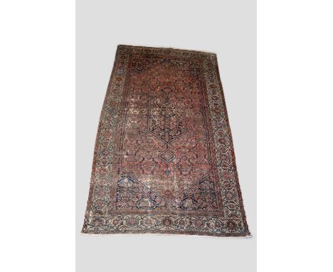 Hamadan kelleh, Feraghan area, north west Persia, early 20th century, 12ft. 3in. X 6ft. 4in. 3.73m. X 1.93m. Overall wear and