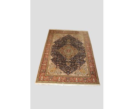 Tabriz(?) carpet, north west Persia, second half 20th century, 11ft. 4in. X 8ft. 4in. 3.45m. X 2.54m. Some fading to top end.