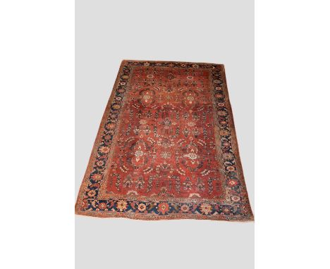 Mahal carpet, north west Persia, circa 1920-30s, 13ft. 9in. X 8ft. 11in. 4.19m. X 2.72m. Overall wear with repairs/re-piling 