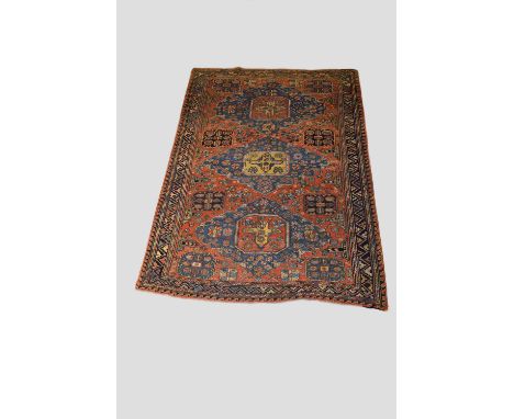 Sumac carpet of three medallion design, Kuba, north east Caucasus, late 19th century, 9ft. 11in. X 6ft. 11in. 3.02m. X 2.11m.