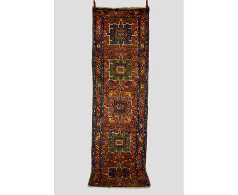 Karaja runner, north west Persia, early 20th century, 10ft. 9in. X 3ft. 1in. 3.28m. X 0.94m. Slight wear. Good, varied palett