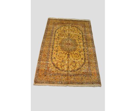 Qum silk carpet, woven signature 'Shirazi' in top outer plain guard, south central Persia, mid-20th century 9ft. 10in. X 6ft.