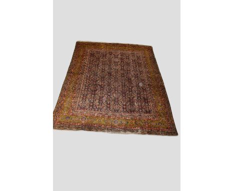 Feraghan carpet, north west Persia, late 19th century, 13ft. 6in. X 10ft. 4in. 4.12m. X 3.25m. Overall wear with reweaves, sm