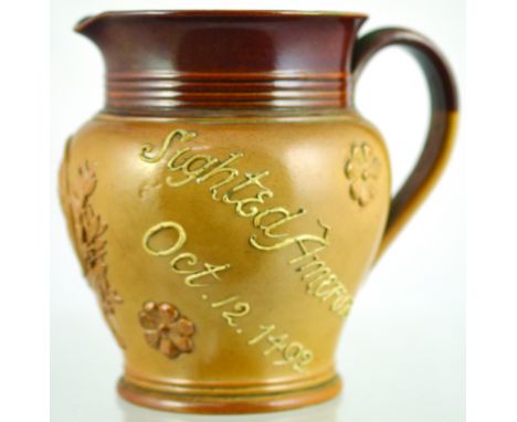 CHRISTOPHER COLUMBUS SALT GLAZE JUG. 6.5ins tall, brown top lower tan glaze, raised portrait of Christopher Columbus to front