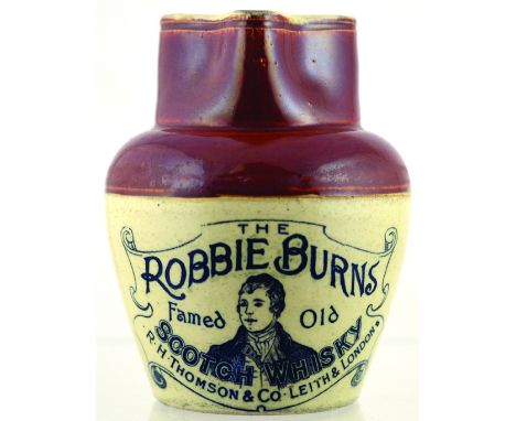 ROBBIE BURNS PUB JUG. 5.75ins tall, brown top, lower off white glaze, black transfer portrait of Robbie Burns pictured THE RO