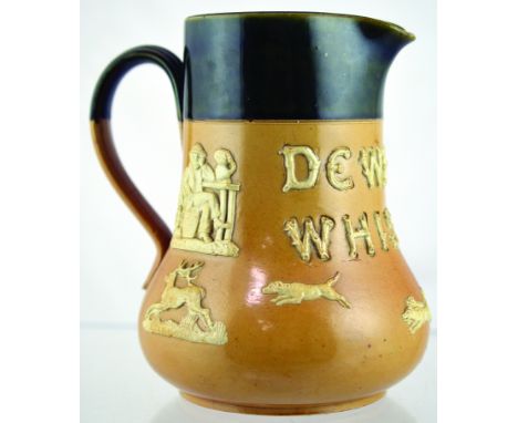 DEWARS WHISKY PUB JUG. 6.75ins tall, green top lower tan salt glaze DEWARS/ WHISKY in white raised lettering with hunting mot