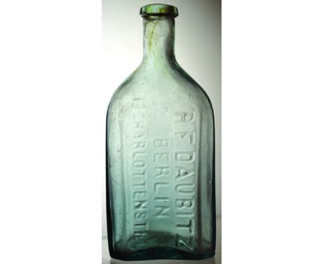 PONTILLED GERMAN BOTTLE. 6.3ins tall, light bluey aqua glass, chunky rectangular form, facetted corners. First embossed R F D