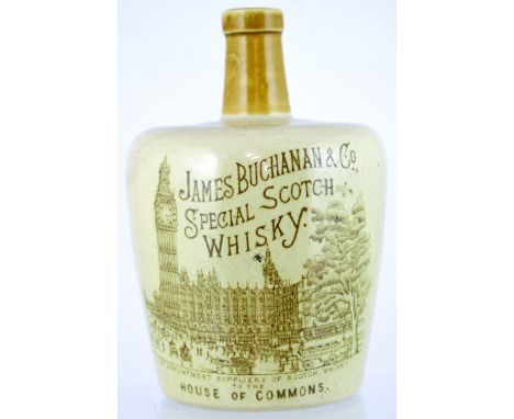 JAMES BUCHANAN WHISKY JUG (WG pg 34). 7.75ins tall, tan neck, rear handle, main body off white glaze, brown transfer JAMES BU