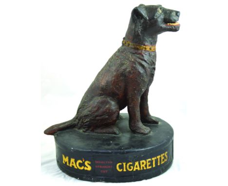 MAC S CIGARETTES SHOP DISPLAY FIGURE. 16.5ins tall, dog figure on circular plinth, plaster of Paris over gauze then naturalis