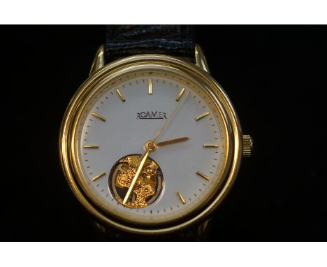 Gents roamer manual wind wristwatch with skeleton feature at 7 o clock with leather strap