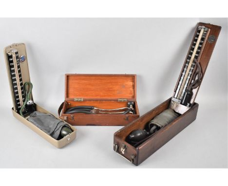 Two Vintage Blood Pressure Meters and a Mahogany Cased Doctor's Stethoscope 
