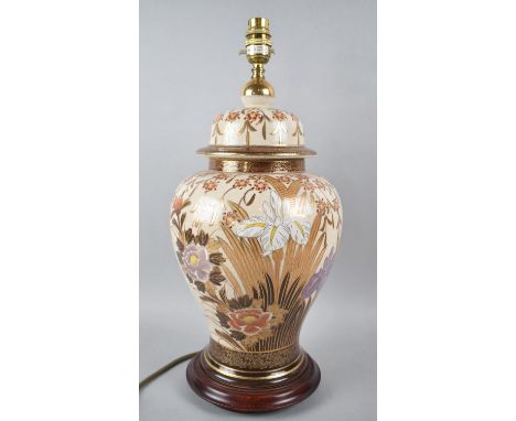 An Oriental Vase Shaped Ceramic Table Lamp Decorated with Flowers and Gilt Highlights, 47cms High 