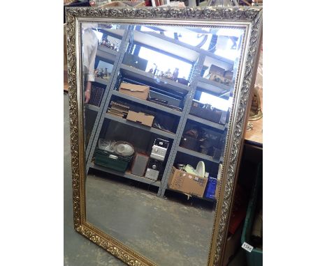 Large gilt framed bevelled edge mirror, 93 x 103 cm. Not available for in-house P&amp;P, contact Paul O'Hea at Mailboxes on 0