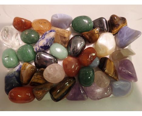 Collection of polished stones including jade, tigers eye and amethyst. P&amp;P Group 1 (£14+VAT for the first lot and £1+VAT 