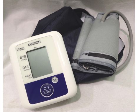 Cased Omron blood pressure monitor. P&amp;P Group 2 (£18+VAT for the first lot and £3+VAT for subsequent lots) 