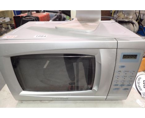 Silver Cookworks 700w microwave. Not available for in-house P&amp;P, contact Paul O'Hea at Mailboxes on 01925 659133. All ele