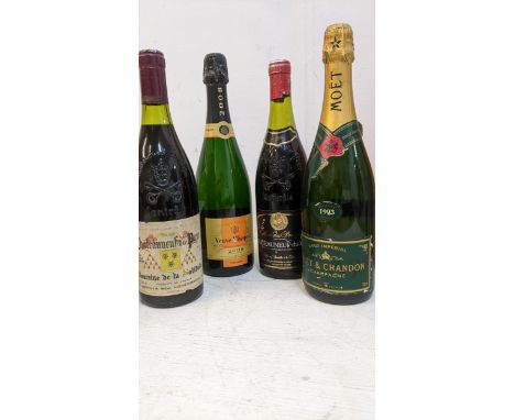 Two bottles of Chateauneuf-du-Pape and two bottles of Champagne to include Veuve Clicquot 2008 vintage, Moet Chandon 1993 vin