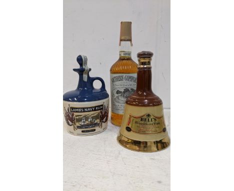 One bottle of Southern Comfort 1lt, one stoneware flask of Navy Rum, 750ml, one Wade flask of Bolls Scotch Whisky 37.5cl 