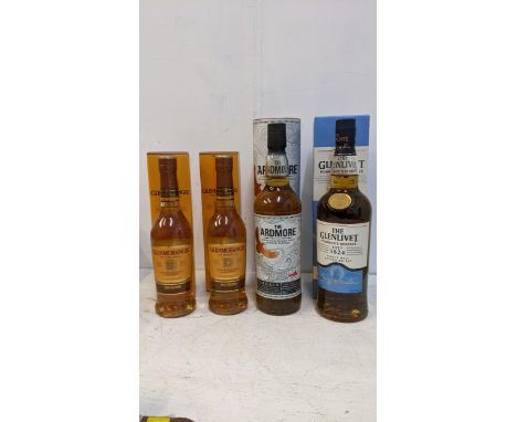 Four bottles of Scotch Whisky to include Glenlivet, Ardmore, Glenmorangie 