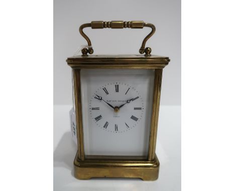 A Matthew Norman brass and glass carriage clock Condition Report: Available upon request