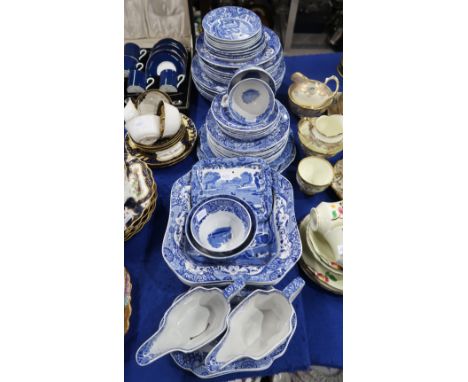 A collection of Copeland Spode Italian pattern tablewares including three square serving dishes, two sauce boats and stands, 