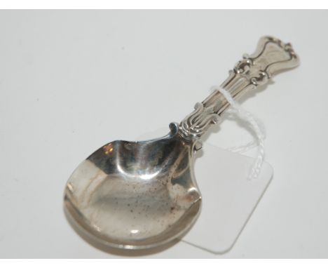 A silver caddy spoon by George Unite, Birmingham marks, 9.5cm long Condition Report: Available upon request