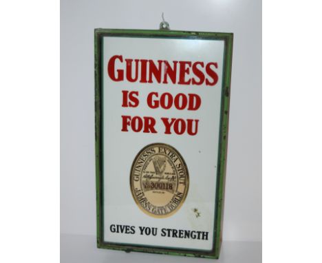 A Guinness is Good For You enamel advertising sign in green-painted metal frame, 50 x 25cm Condition Report: Available upon r