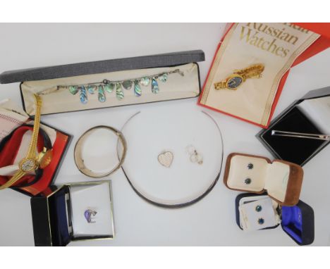 A silver torc necklace, bangle, paua shell necklace, Sekonda watch and other items Condition Report: Not available for this l