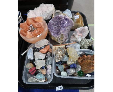 A selection of semi precious stones, crystals and geodes including amethyst, rose quartz, tigers eye, a Himalayan salt lamp e