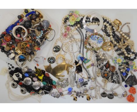 A large cat brooch, a 'Miracle' stags head brooch, ceramic sheep dog and fish brooch etc Condition Report: Not available for 