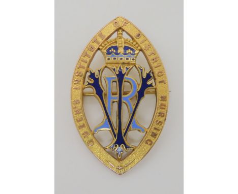 A 9ct gold and enamel Nursing long service brooch, weight 9.9gms Condition Report: Available upon request